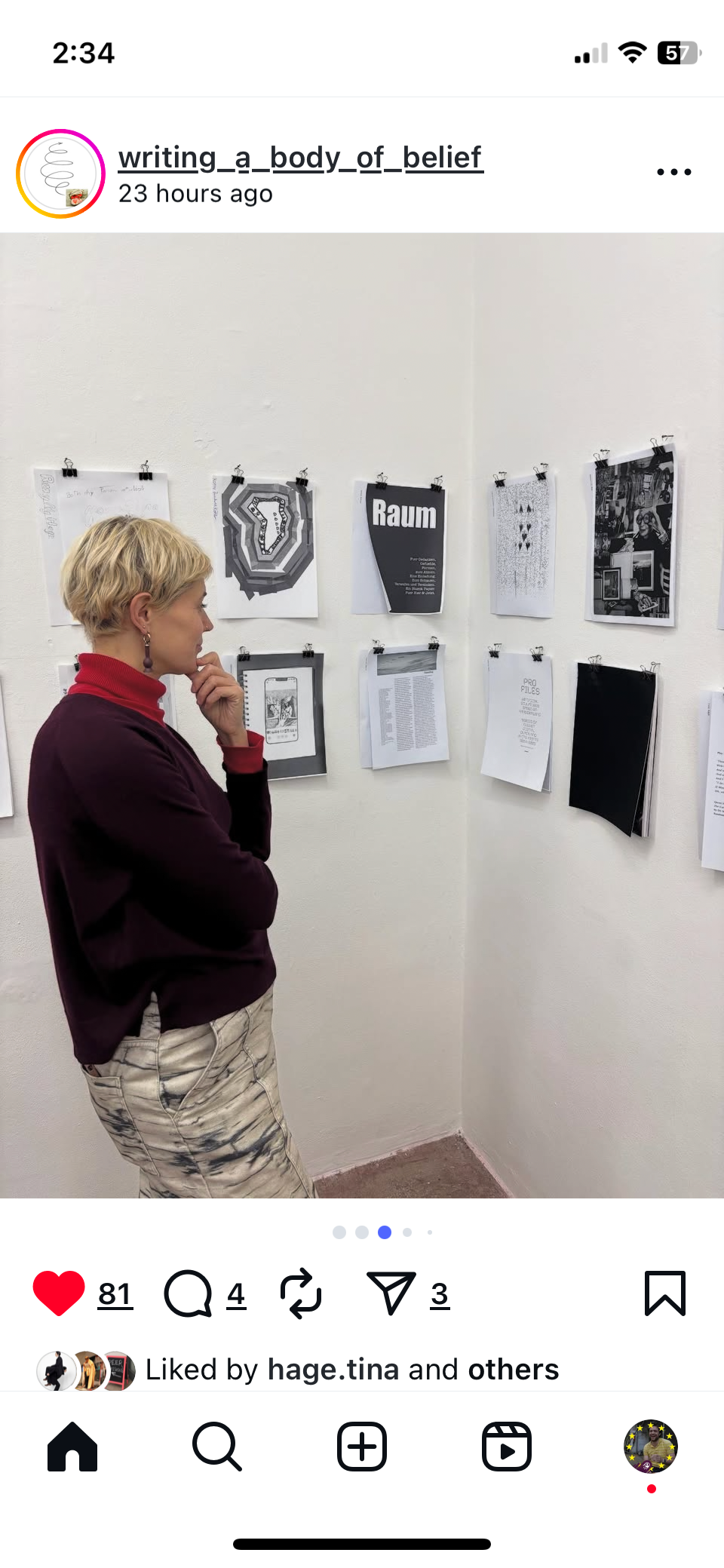 Instagram screenshot of a visitor viewing printed contributions at What is an Art Book? Volume 4