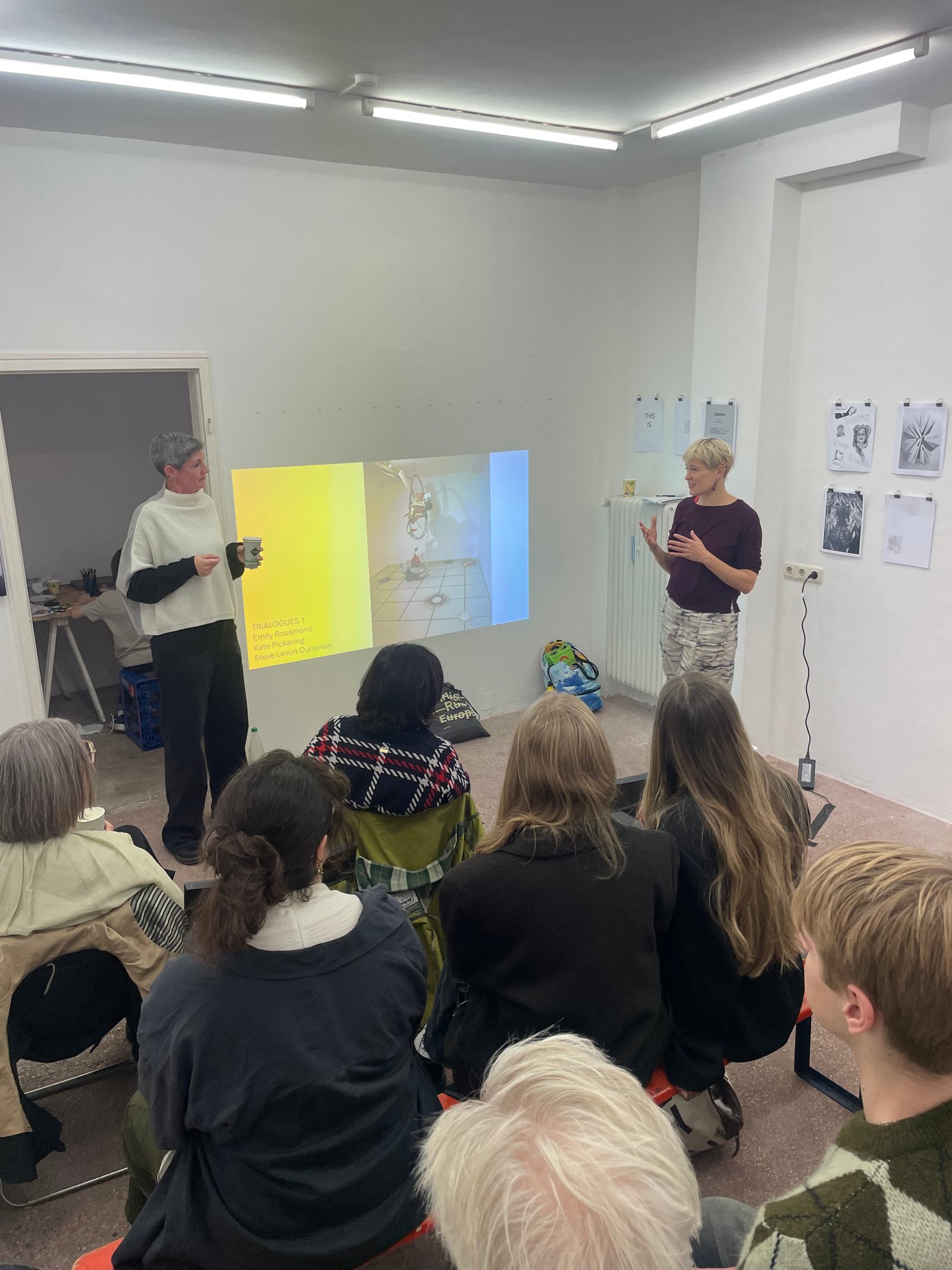 Audience watching a presentation at What is an Art Book? Volume 4, Space n.n, Munich